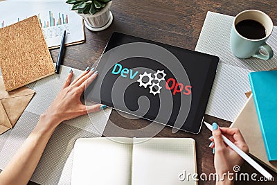 DevOps - development cycles of Automation and monitoring at all steps of software construction. Stock Photo