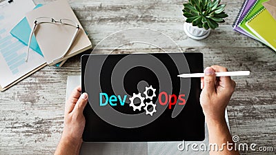 DevOps - development cycles of Automation and monitoring at all steps of software construction. Stock Photo