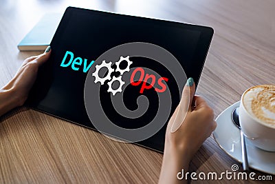 DevOps - development cycles of Automation and monitoring at all steps of software construction. Stock Photo