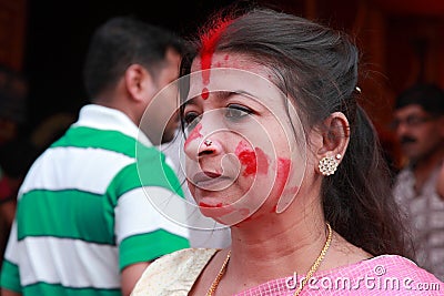 Devotee celebrates Durga puja Editorial Stock Photo