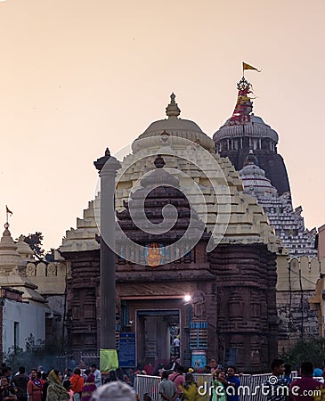 Devotees at the entrance of Hindu Temple (Jagannath Temple) at Puri, Odisha, India. Editorial Stock Photo