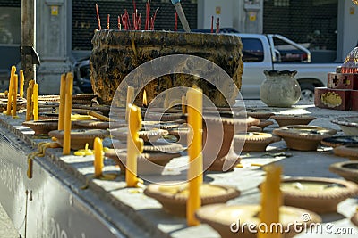 Candles and lamps at Wat Ming Muang, Chiang Rai, Thailand Editorial Stock Photo