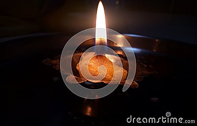 Devotional Flame a Symbol of hope Stock Photo