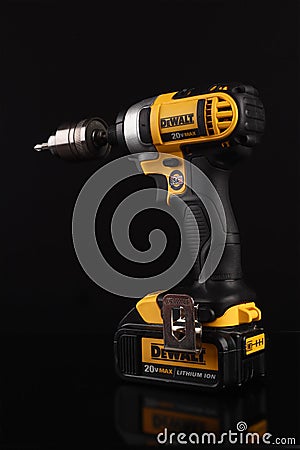 DeWalt cordless power drill on a black background Editorial Stock Photo