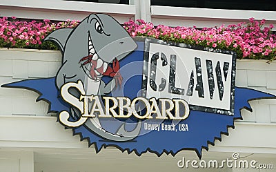 Dewey Beach, Delaware, U.S.A - July 4, 2023 - The Starboard Claw restaurant and bar sign Editorial Stock Photo