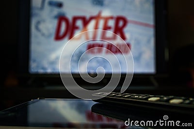 Dexter Tv series and TV controller. Dexter: New Blood is an American crime drama mystery miniseries developed for Showtime as a Editorial Stock Photo