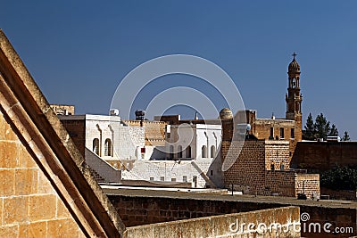 Traditional architecture and church in Midyat Stock Photo