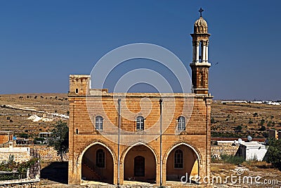 Traditional architecture and church in Midyat Stock Photo