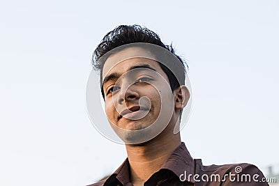 Dhaka, Bangladesh, February 24 2017: Portrait of a smiling young man Editorial Stock Photo