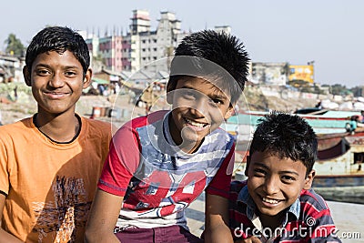 Dhaka, Bangladesh, February 24 2017: Three teenagers posing proudly Editorial Stock Photo