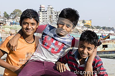Dhaka, Bangladesh, February 24 2017: Three teenagers posing proudly Editorial Stock Photo