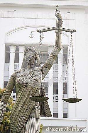 Dhaka, Bangladesh, -January, 21, 2019 : the iron made portrait of justice goddess themis in fron of supreme court Editorial Stock Photo