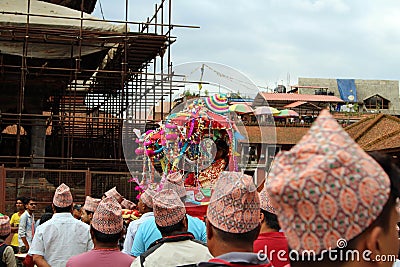 The `Dhaka Topi` worn by local Nepali people who are having a festival around Patan Durbar Square Editorial Stock Photo