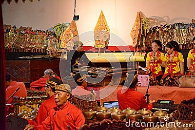 Dhalang / Dalang` The puppeteer in Indonesia Wayang performance Editorial Stock Photo