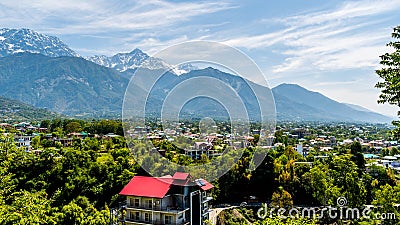 Dharamshala of Himachal Pradesh surrounded by cedar forests and Dhauladhar mountain range Stock Photo