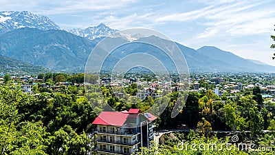 Dharamshala of Himachal Pradesh surrounded by cedar forests and Dhauladhar mountain range Stock Photo