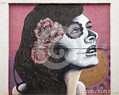 Dia de los Muertos mural by Chee in an alley by the building of Living Arts of Tulsa, Oklahoma. Editorial Stock Photo