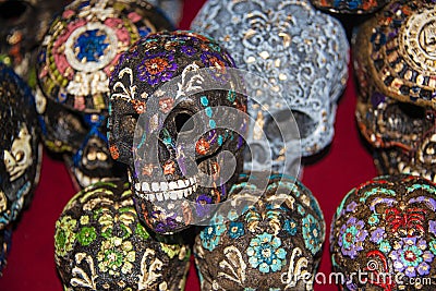 Dia de Muertos or Day of the Dead holiday skulls are a common symbol of the holiday at Mexican markets in Mexico Stock Photo