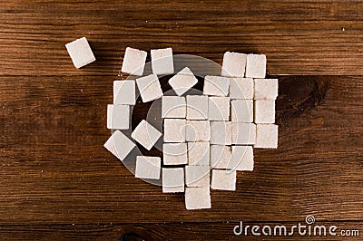 Diabetes is terrible disease. Heart of sugar cubes Stock Photo