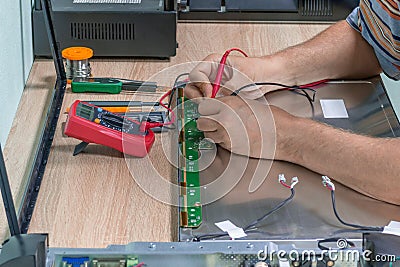 Diagnosis of malfunction and repair of lcd TV and monitor in the service center Stock Photo