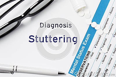 Diagnosis of Stuttering. Results of mental status exam, container with pills with inscription psychiatric diagnosis Stuttering on Stock Photo