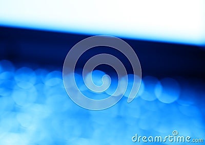 Diagonal blue laptop keyboard bokeh background Stock Photo