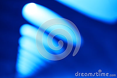 Diagonal blue office lamps bokeh background Stock Photo