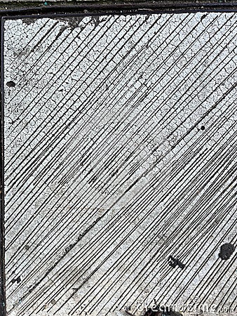 Diagonal scratches on a concrete surface Stock Photo