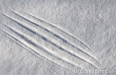 Diagonal scratches on loose snow Stock Photo