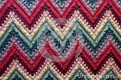 diagonal view of a crochet scarf with repeating patterns Stock Photo