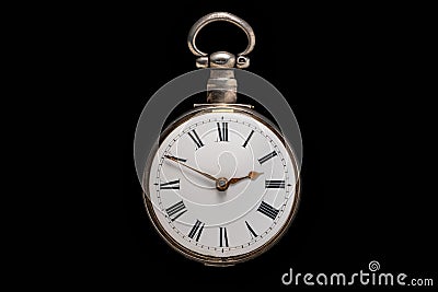Dial of silver antique pocket watch on isolated black background. Old mechanical clock. Round retro pocketwatch with Stock Photo