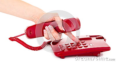 Dialing on the red phone Stock Photo