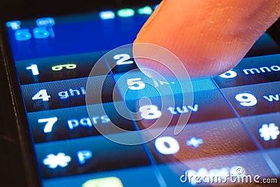 Dialing on smartphone Stock Photo