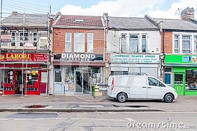 Diamond Carpets and Newbury Travel Goods Deserted and empty next door shop Editorial Stock Photo