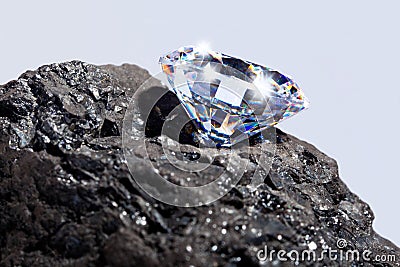 Diamond and Coal plain background. Stock Photo