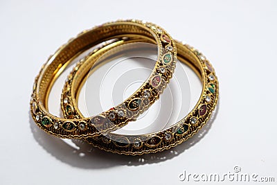 Diamond, gold new design jewellery bangles on white blur background Stock Photo