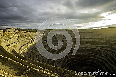 Diamond mining pit in the town of Udachniy, Yakutia, Russia. ALROSA. Stock Photo