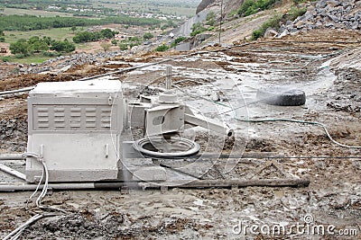 Diamond wire saw machine in a granite quarry Stock Photo