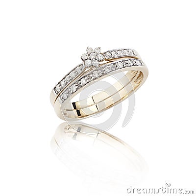 Diamonds ring on golden body shape Stock Photo