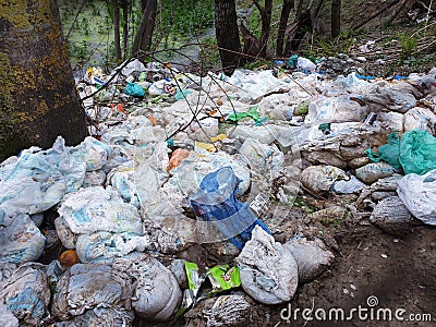 Diapers waste on earth Stock Photo