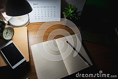 Diary and notebook for Planner to plan agenda, reminder, timetable, daily appointment, management on table. Calender, laptop, Stock Photo