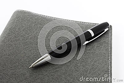 Diary and pen isolate on white background Stock Photo