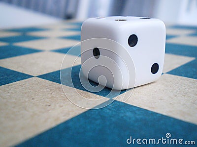 Dice on Chess Board Stock Photo