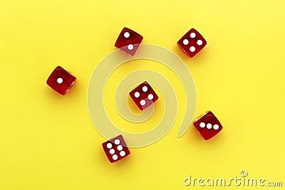 Six red dice lie on an isolated background. Stock Photo