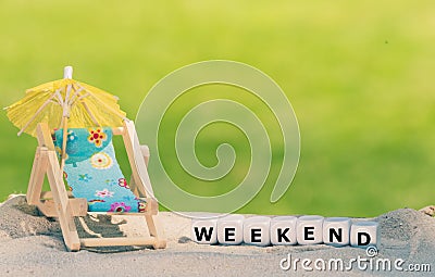 Dice form the word `weekend` Stock Photo