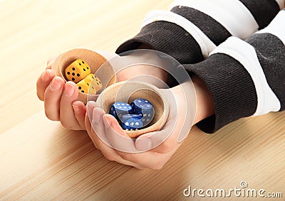 Dice on palms Stock Photo