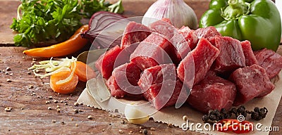 Diced fresh raw lean beef steak for goulash Stock Photo