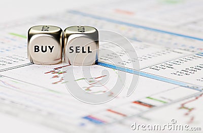 Dices cubes with the words SELL BUY on financial downtrend chart Stock Photo