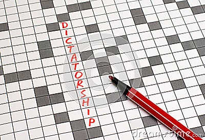 Dictatorship. Text in crossword. Red letters Stock Photo