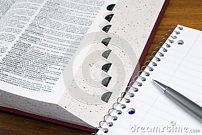 Dictionary and notebook Stock Photo